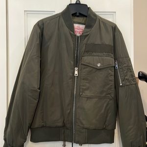 Brand new with tags Levi’s army, green bomber, jacket, size small women’s.